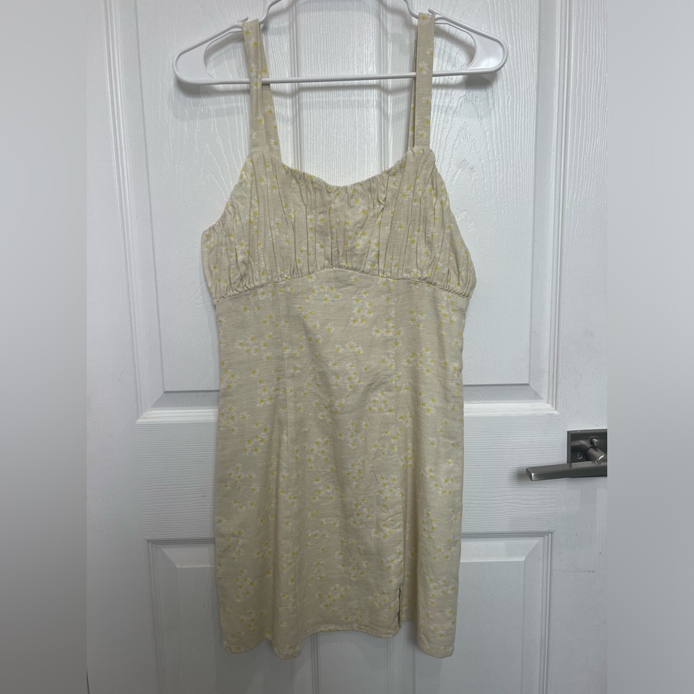 Mini cream dress with yellow floral details